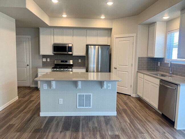 Building Photo - BUILT IN 2021 4 BEDROOM HOME LOCATED in th...