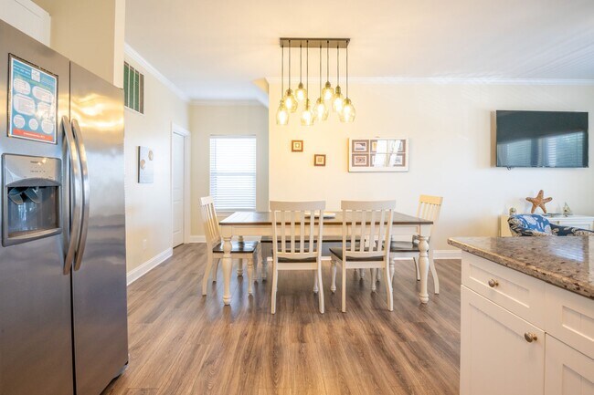 Building Photo - PRICE REDUCTION! LIVE AT THE BEACH FOR THE WINTER - AVAILABLE MID-FEBRUARY