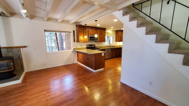Building Photo - LONG-TERM RENTAL: Great Cedar Flat Home with Carport & Gas Fireplace!