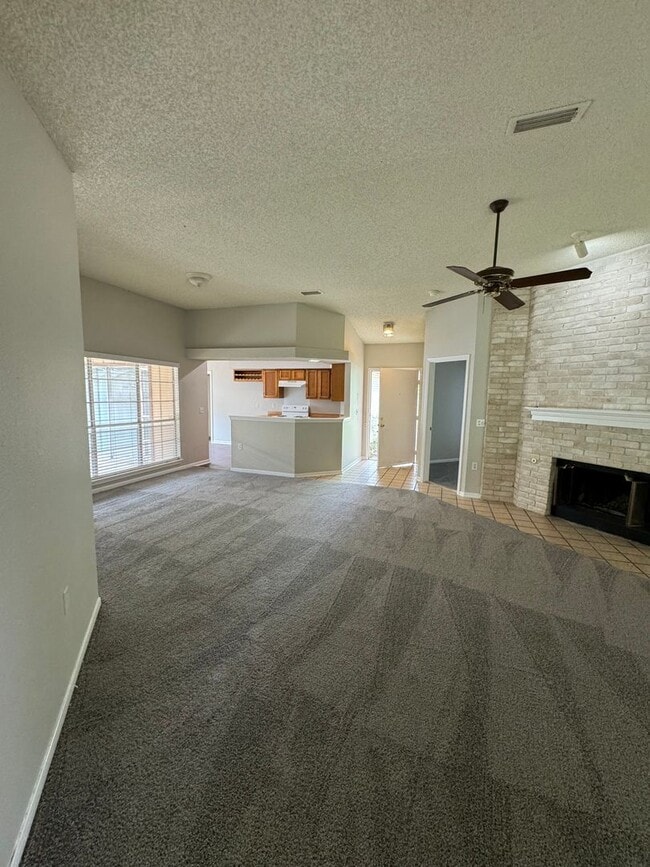 Building Photo - NICE 3 BEDROOM FEATURING WOOD VINYL PLANK ...