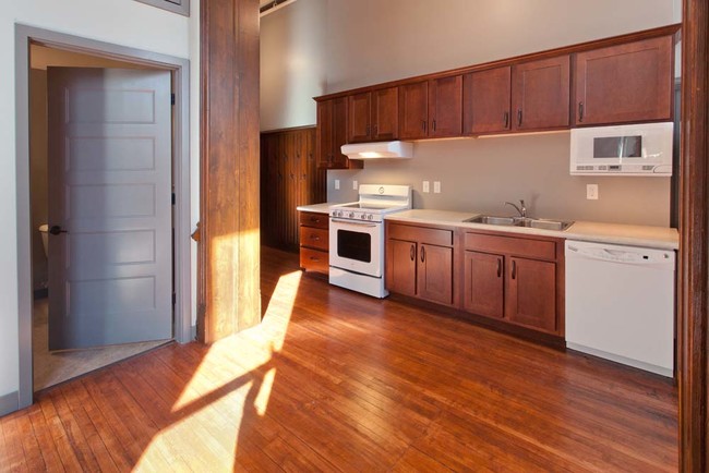 You'll love the hardwood floors. - Roosevelt School Apartments