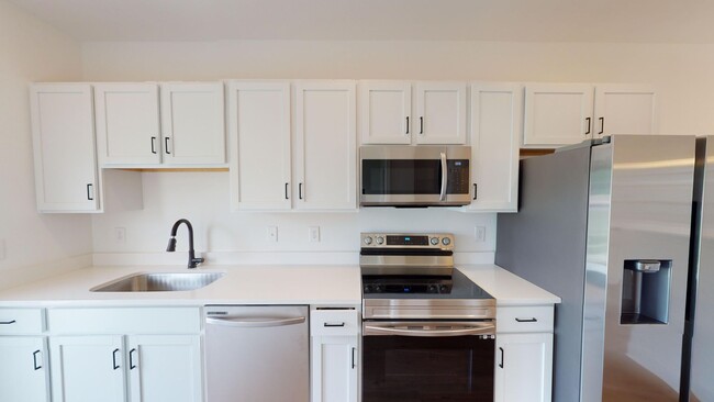 Building Photo - Comfort & Style – Beautiful 2-Bedroom Town...