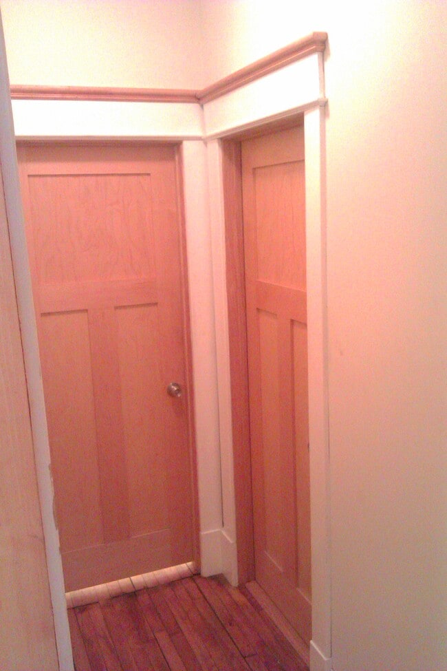Bedroom #3 door on the left and Bathroom door on the right. - 1016 Iglehart Ave