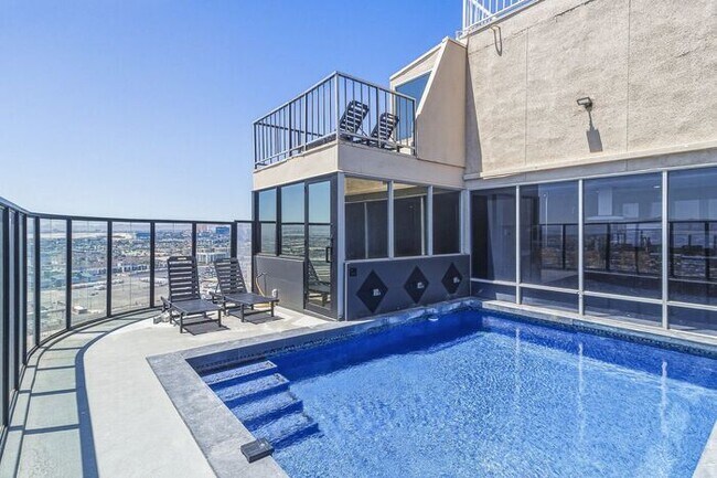 Building Photo - Luxury Penthouse Retreat with Private Pool, Sauna & Strip Views