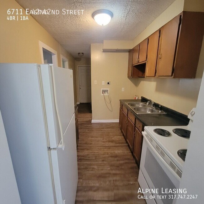 Foto del edificio - 6711 E 42nd St