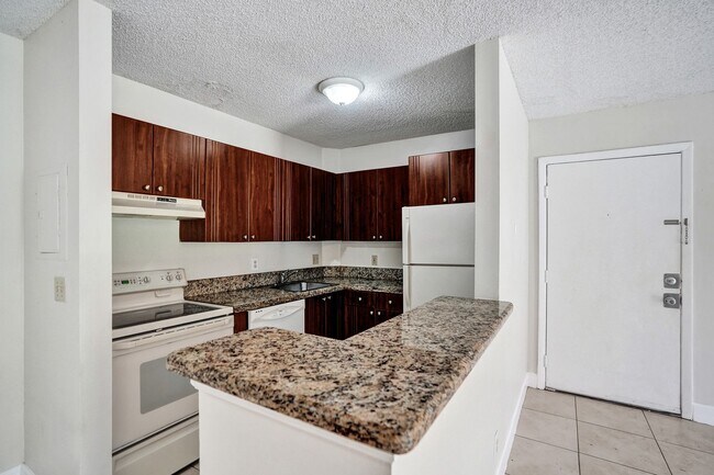 Building Photo - Updated 2 Bed, 2 Bath 1st Floor Condo with...