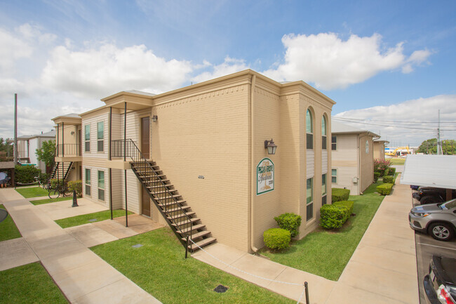 Exterior on Stella St. - Pecan Grove Apartments