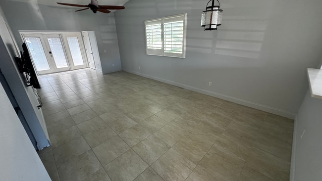 living/dining with pass-thru to kitchen - 163 Breezeway Ct