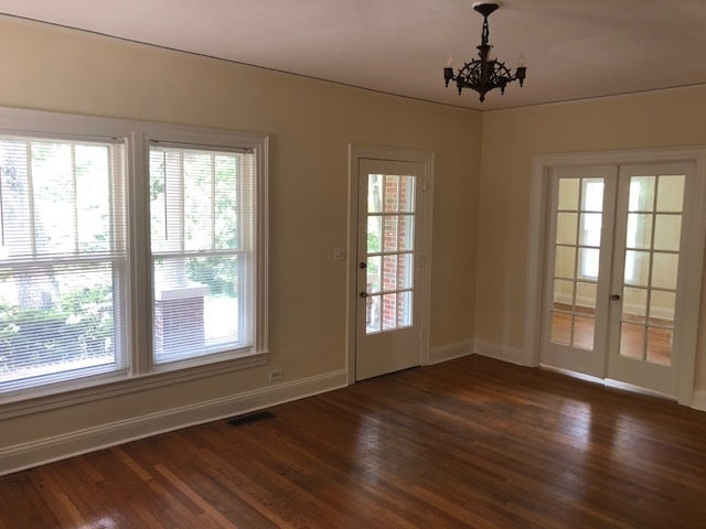front entry and living room with double doors to dining room - 407 Warren St