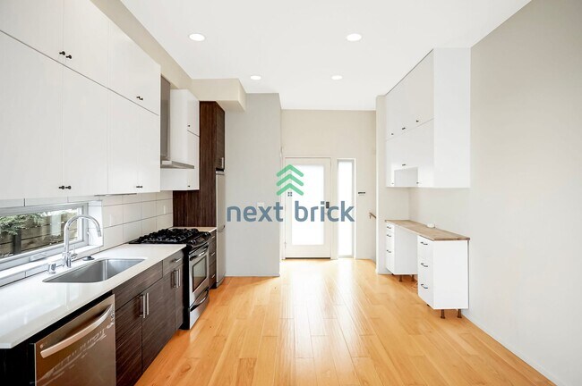 Photo - 2 BED & 1.5 BATH URBAN ELEGANCE AND ROOFTO... Townhome