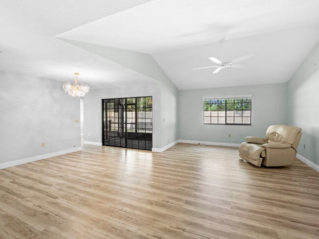 Building Photo - Renovated Gated Townhome with Garage & Community Pool