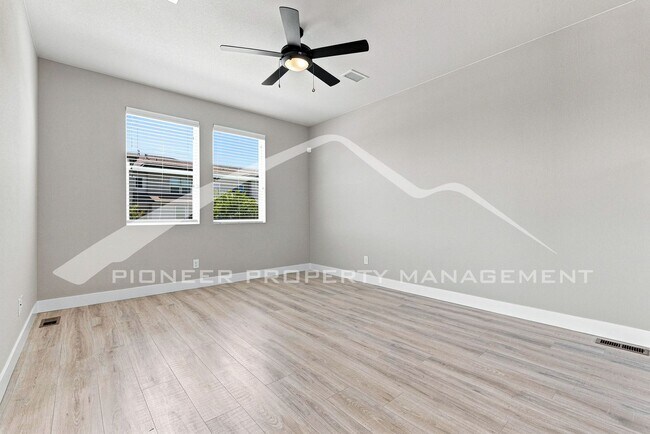 Photo - Spacious Townhouse with Central AC and 2-Car Garage