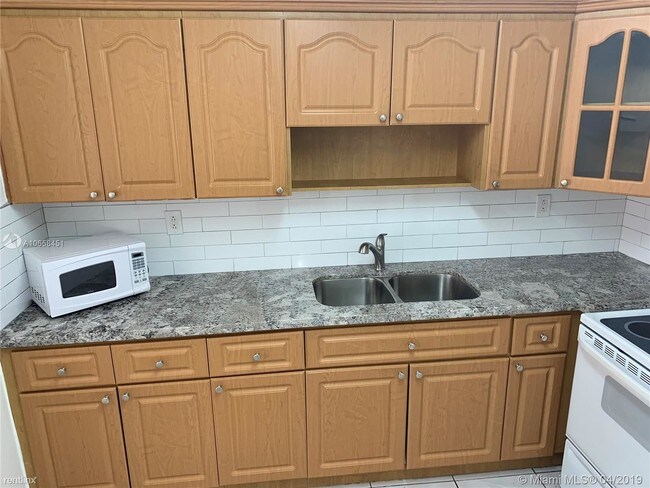 Building Photo - 2 br, 2 bath Condo - 6190 W 19th Ave Apt 106