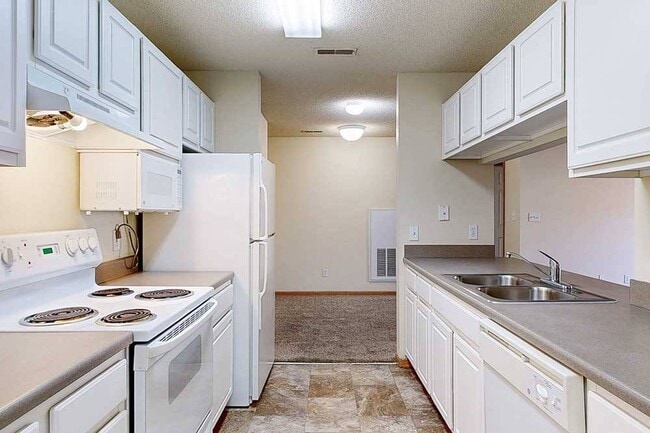 There's no shortage of cabinet space in our kitchens. - Northbrook Apartments