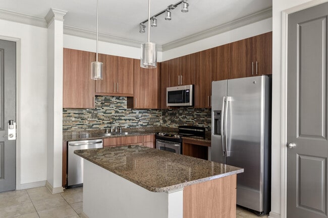Explore this sleek kitchen, perfect for culinary enthusiasts and modern living. - Rowe Vinings