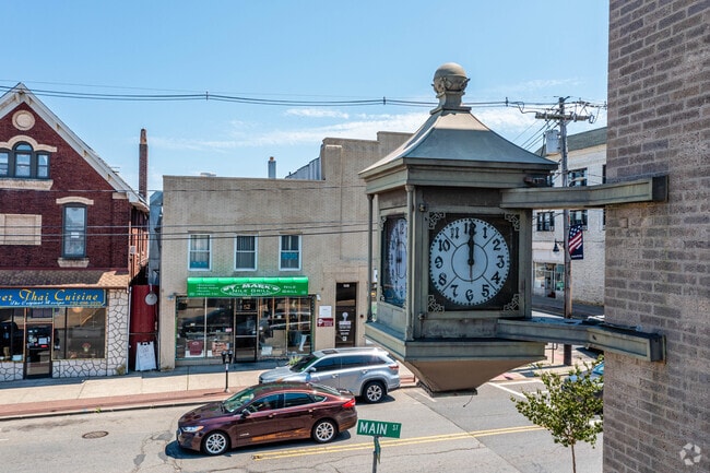 The clock at the local town bank overlooks the downtown section of South River, NJ.