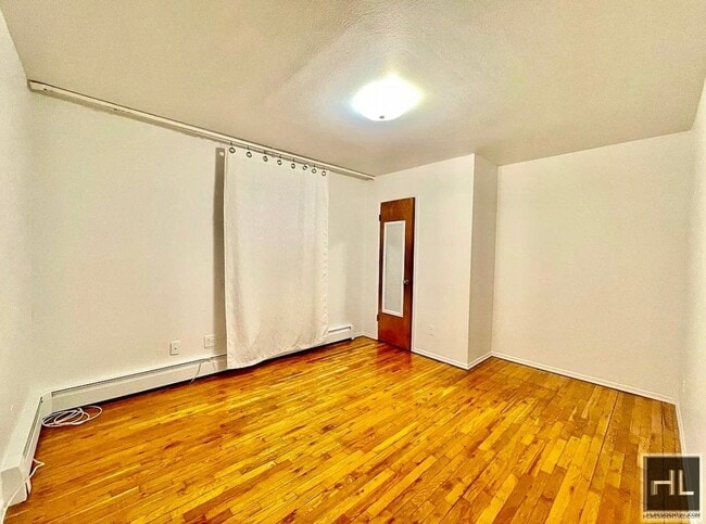 Building Photo - 2 bedroom apartment available near the R line