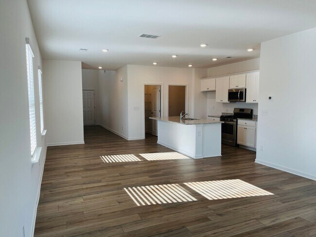 Building Photo - Wow! Brand NEW! 5 bed, 2.5 bath home, 2 ca...