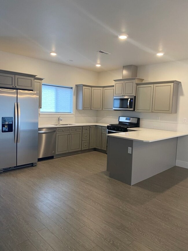 Building Photo - Discover this Gorgeous Townhome