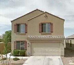 Building Photo - 37154 W Amalfi Ave