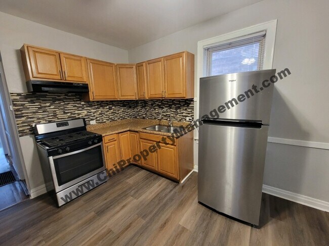 Foto del edificio - 6838 S Maplewood Ave