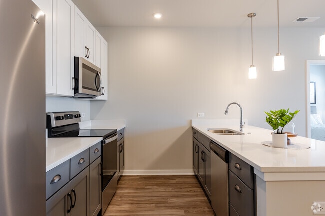 3BR, 2BA - 1,245SF - Kitchen - Seasons at Hoffman Estates