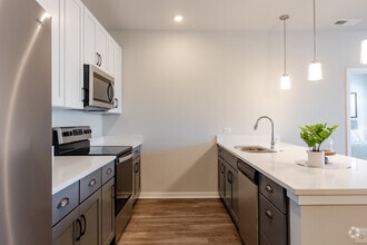 3BR, 2BA - 1,245SF - Kitchen - Seasons at Hoffman Estates