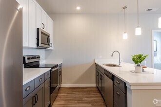 3BR, 2BA - 1,245SF - Kitchen - Seasons at Hoffman Estates