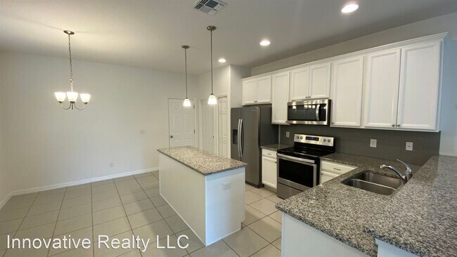 Building Photo - 3 br, 2.5 bath House - 6952 Tussilago Way
