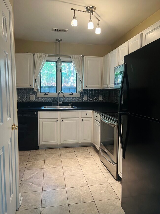 Foto del edificio - 4311 Southwind Dr