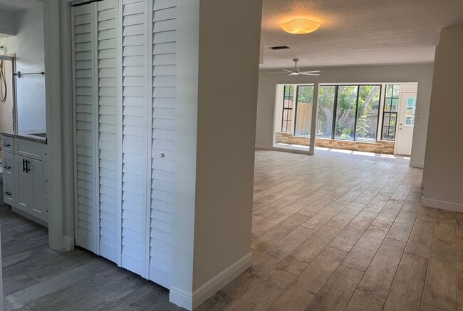 At the entrance of the property there is a linen closet as well as a sweeping view of the backyard. - 4142 Iola Dr