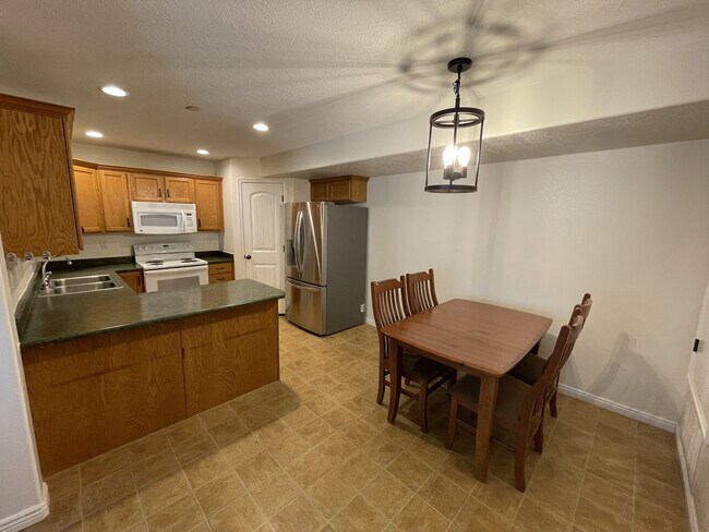 Kitchen & Dining Room - 3812 E Rock Creek Rd