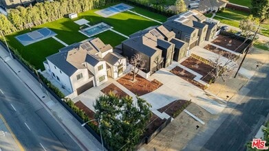 Building Photo - 8670 Encino Ave