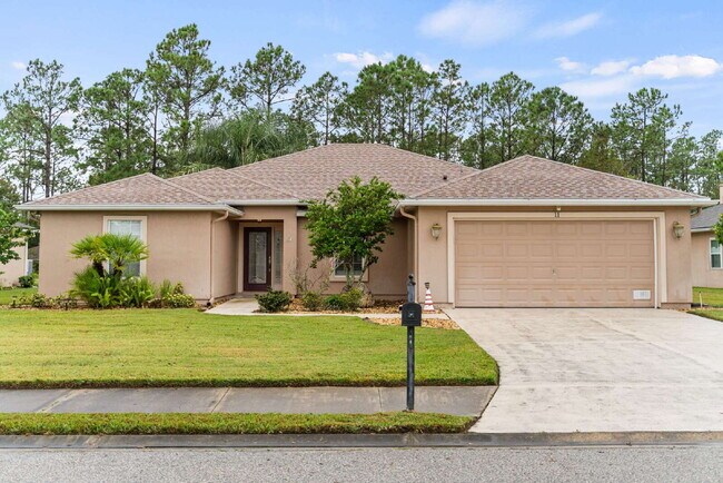 Foto del edificio - Luxurious Palm Coast Retreat: 4-Bed 3 Bath...