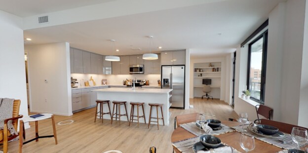 spacious kitchen with island and plenty of storage - 4109 E 10th Ave