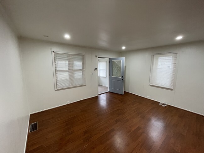 Recessed high efficiency lighting illuminate the living room - 212 Lorenz Ave