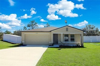 Building Photo - 10276 N Spaulding Dr
