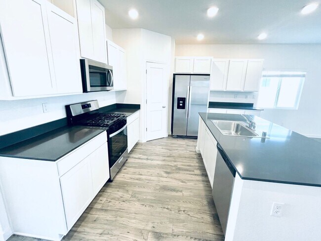 Building Photo - Newer 4 Bedroom Home, 3 car garage