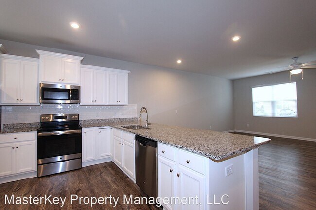 Foto del edificio - 3 br, 2.5 bath House - 8873 Commons Townes Dr