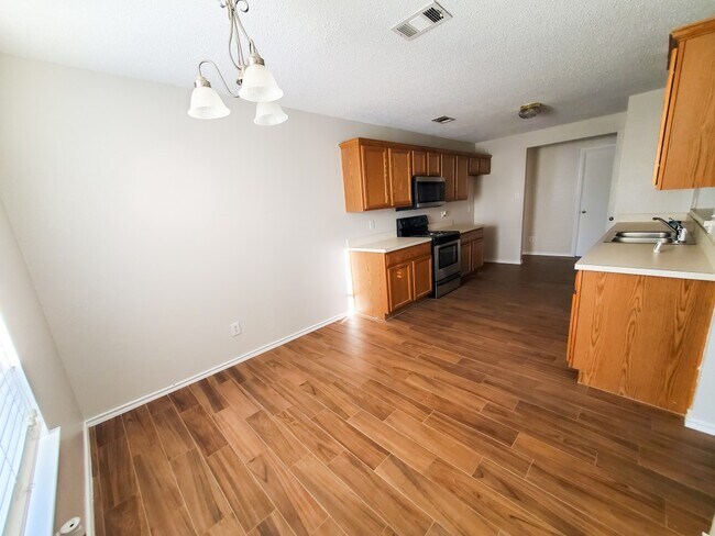 Kitchen in the main house - 10739 Linda Cir