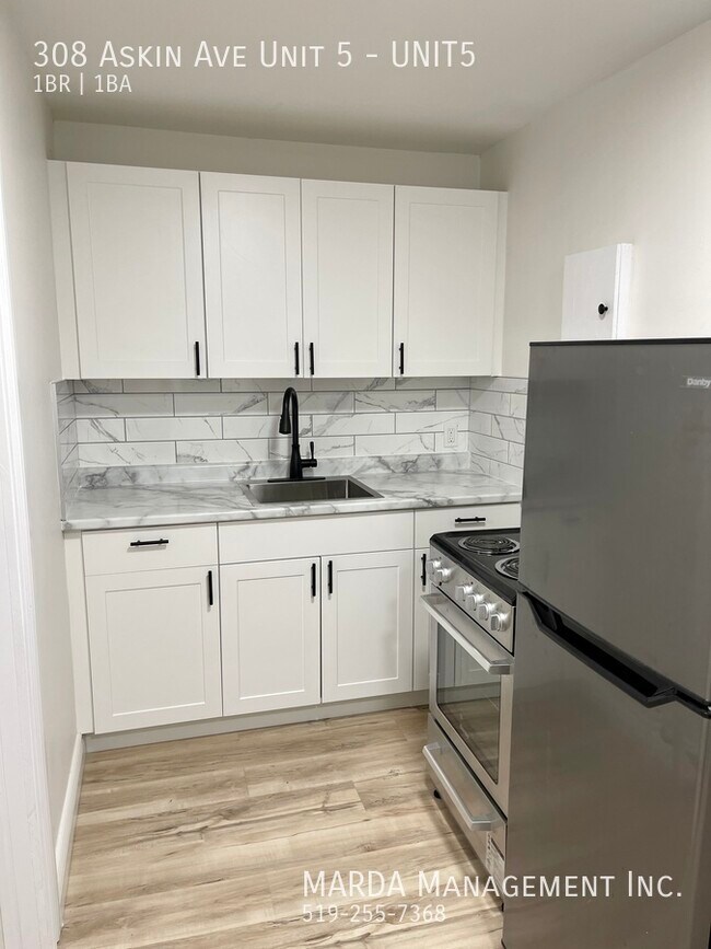 Photo du bâtiment - ENJOY TWO MONTHS FREE RENT!!COZY 1-BEDROOM...