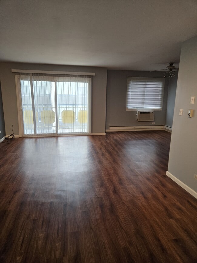 living room w/balcony - 2772 E 75th St