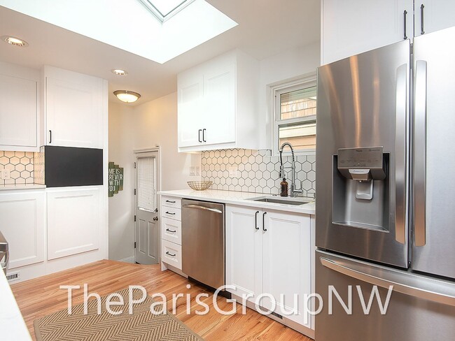 Building Photo - Renovated Magnolia Home – Open Floor Plan ...