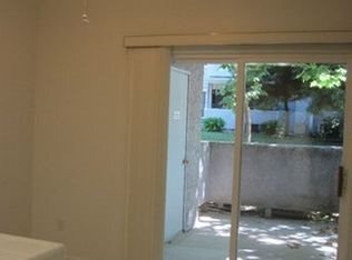Building Photo - Downstairs two bedroom condo in gated comm...