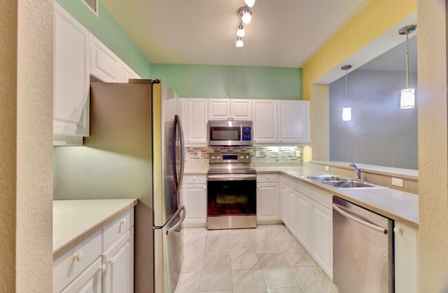 Building Photo - ANNUAL RENTAL – Spacious 3BR/2.5BA First-Floor Condo with Elevator Access in Charlotte Harbor