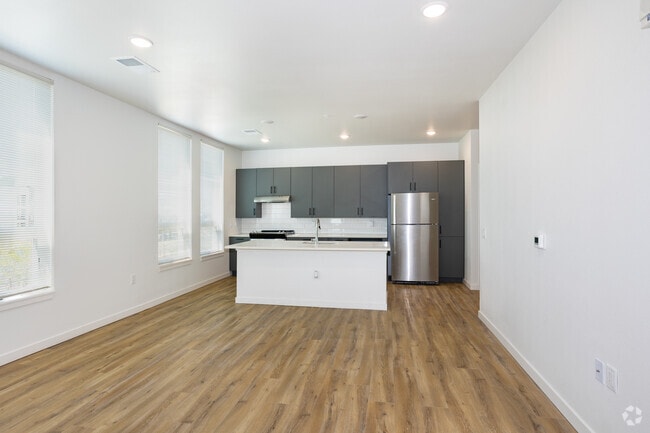 3BR, 2BA - 1,229SF - Living Room / Kitchen - Ralston Gardens