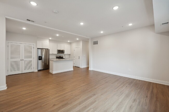 Building Photo - "NEW CONSTRUCTION Urban Living: Spacious 4...