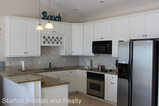 Building Photo - 4 br, 3.5 bath House - 322 Sea Star Circle