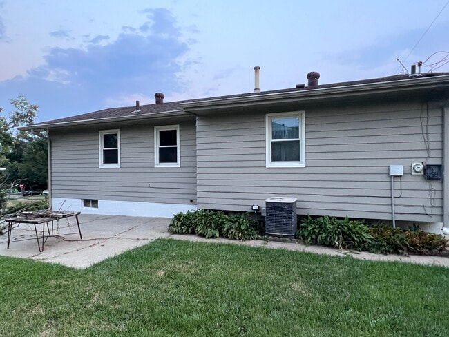 Back of house with patio - 8120 Burdette St