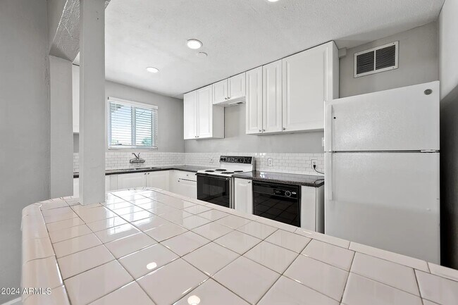 Foto del edificio - 4009 N 13th Ave